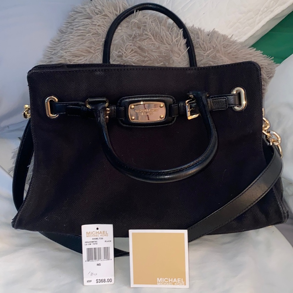 Micheal Kora bag- Gently used, black and gold chain color.